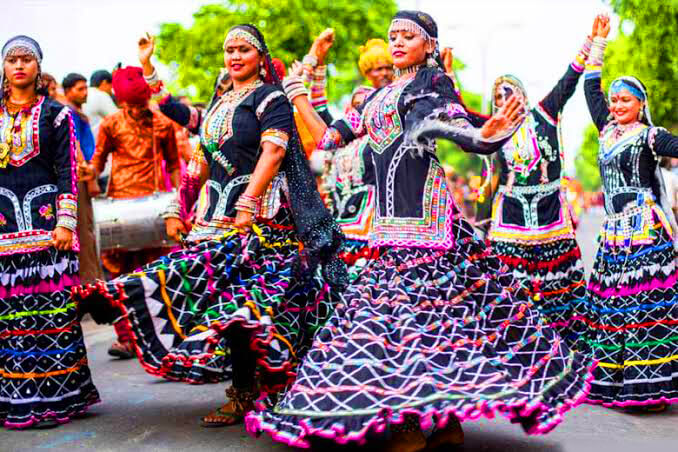 Kalbeliya dancer in traditional black lehenga performing